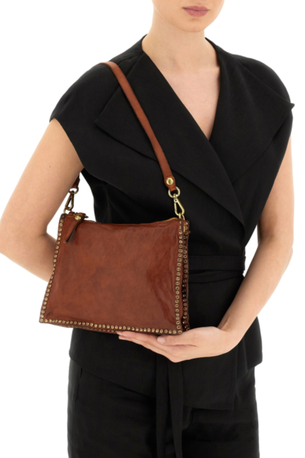 EVA MONTEPULCIANO COSTRA Clutch bag by Campomaggi